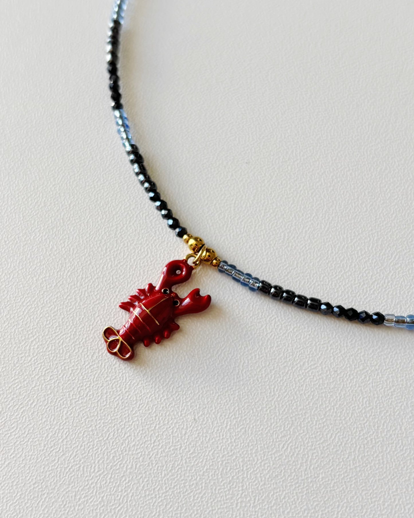 Collier de perles Homard